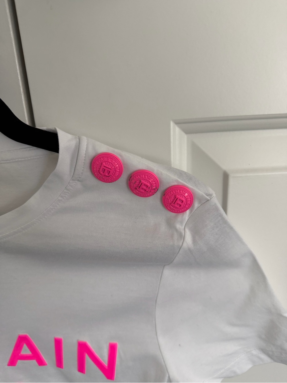 Balmain White Tee with Neon Pink Logo and Shoulder Buttons - Picture 2 of 5